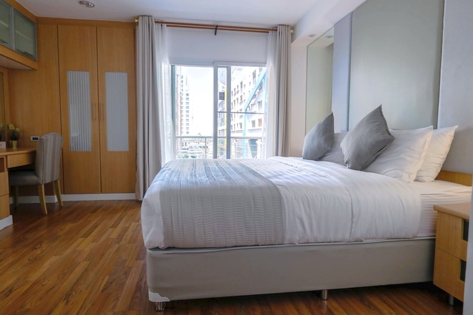 Imagen de la habitación del Hotel Jj Suites - Your Home On 11. Foto 9