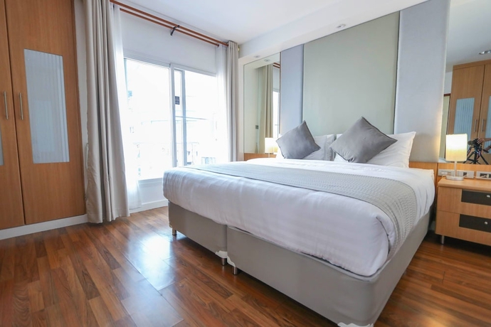 Imagen de la habitación del Hotel Jj Suites - Your Home On 11. Foto 10