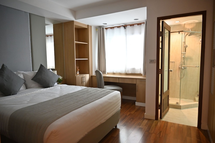 Imagen de la habitación del Hotel Jj Suites - Your Home On 11. Foto 11