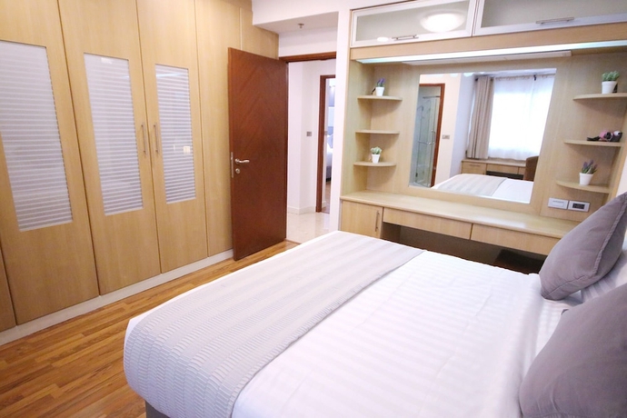 Imagen de la habitación del Hotel Jj Suites - Your Home On 11. Foto 13