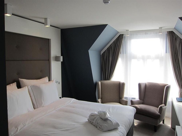 Imagen de la habitación del Hotel Jl No76. Foto 10