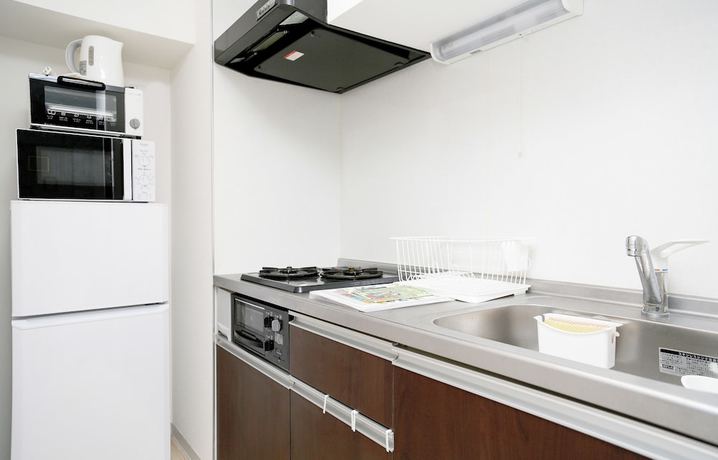 Imagen de la habitación del Hotel Jl Residence. Foto 19