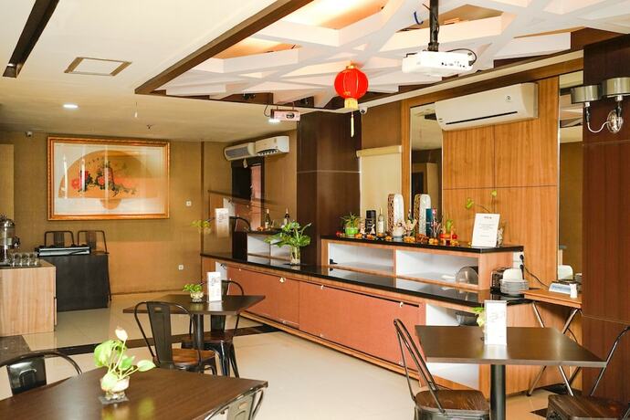 Imagen del bar/restaurante del Hotel Jle's Boutique Powered By Archipelago. Foto 12