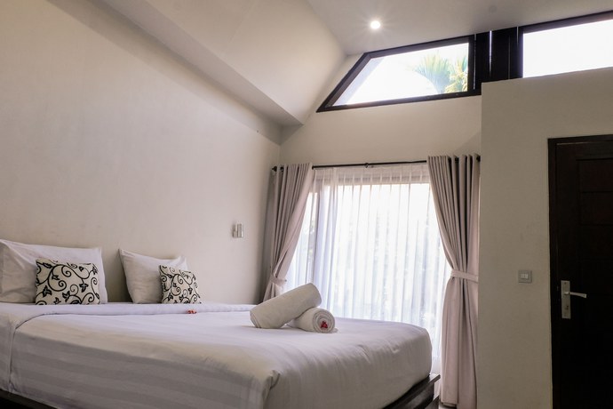 Imagen de la habitación del Hotel Jm Kuta Lombok. Foto 6