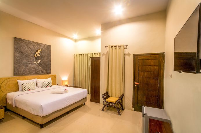 Imagen de la habitación del Hotel Jm Kuta Lombok. Foto 12
