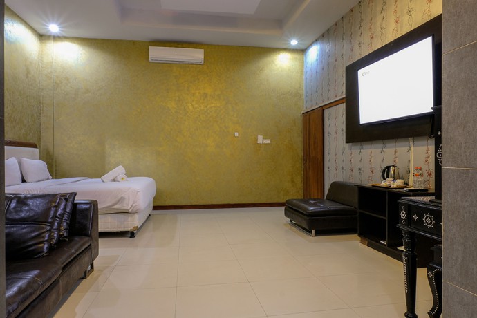 Imagen de la habitación del Hotel Jm Kuta Lombok. Foto 13