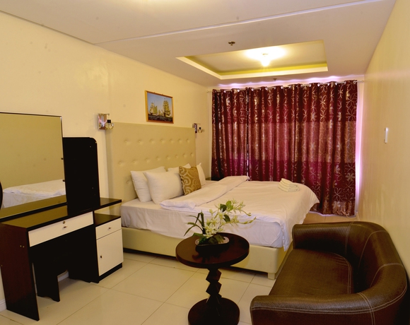 Imagen de la habitación del Hotel Jmm Grand Suites. Foto 6