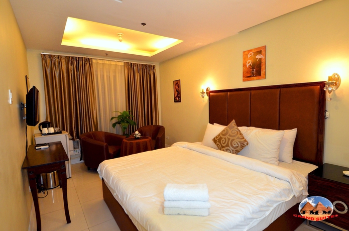 Imagen de la habitación del Hotel Jmm Grand Suites. Foto 7