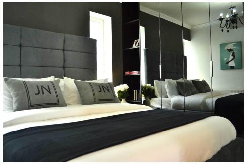 Imagen de la habitación del Hotel Jn Boutique Apartments. Foto 9