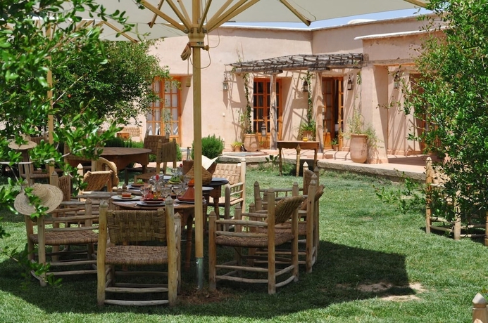 Imagen del bar/restaurante del Hotel Jnane Tihihit. Foto 2