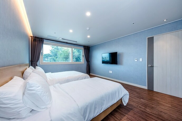 Imagen de la habitación del Hotel Jnb Family. Foto 15