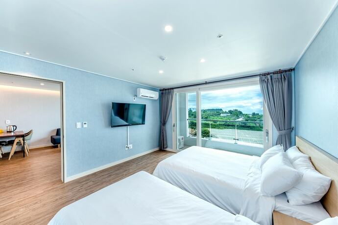 Imagen de la habitación del Hotel Jnb Family. Foto 19