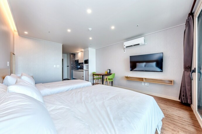 Imagen de la habitación del Hotel Jnb Family. Foto 21