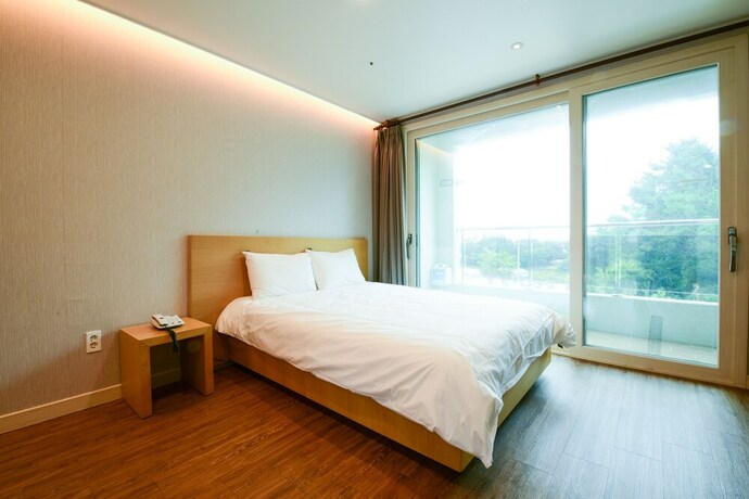 Imagen de la habitación del Hotel Jnb Family. Foto 22