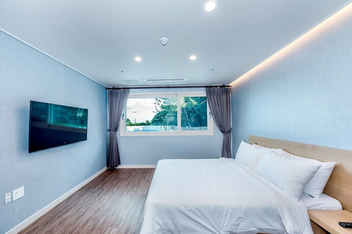 Imagen de la habitación del Hotel Jnb Family. Foto 23