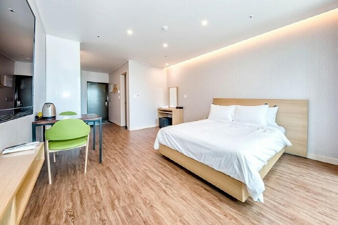 Imagen de la habitación del Hotel Jnb Family. Foto 25