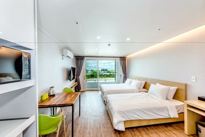 Imagen de la habitación del Hotel Jnb Family. Foto 28