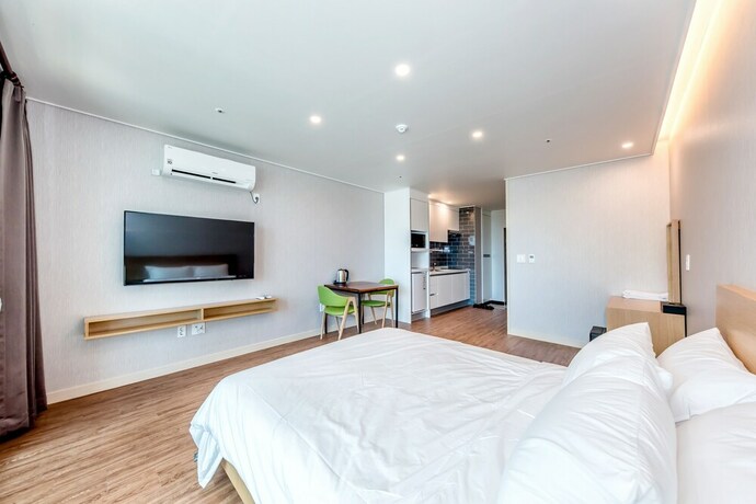 Imagen de la habitación del Hotel Jnb Family. Foto 31