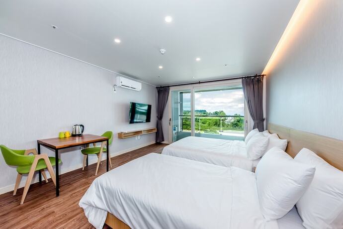 Imagen de la habitación del Hotel Jnb Family. Foto 38