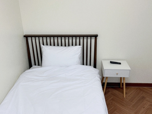 Imagen de la habitación del Hotel Jnineguesthouse. Foto 1