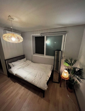 Imagen de la habitación del Hotel Jnineguesthouse. Foto 10