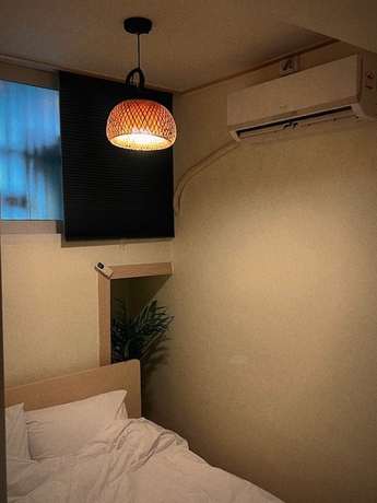 Imagen de la habitación del Hotel Jnineguesthouse. Foto 11