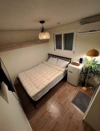 Imagen de la habitación del Hotel Jnineguesthouse. Foto 13