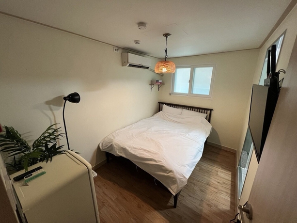 Imagen de la habitación del Hotel Jnineguesthouse. Foto 14