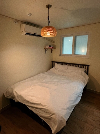 Imagen de la habitación del Hotel Jnineguesthouse. Foto 15