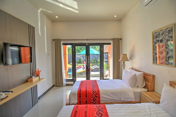 Imagen de la habitación del Hotel Jnj Guest House. Foto 18
