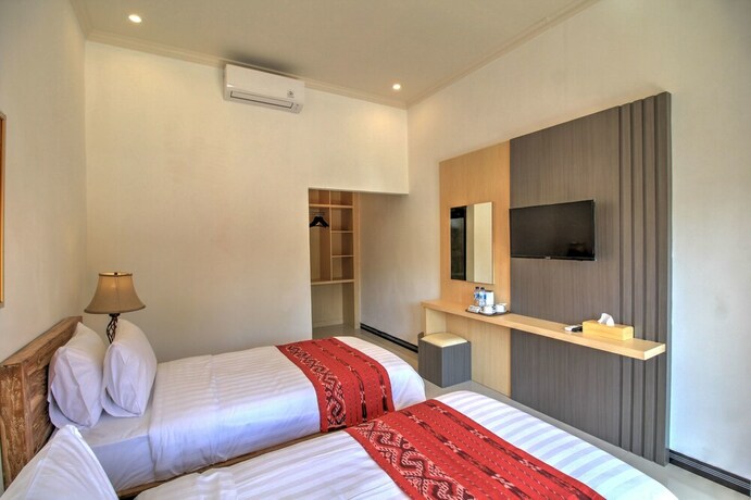 Imagen de la habitación del Hotel Jnj Guest House. Foto 19