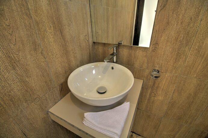 Imagen de la habitación del Hotel Jnj Guest House. Foto 23