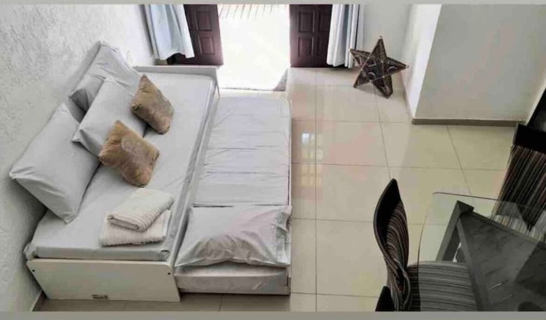 Imagen de la habitación del Hotel Joaquina Guest House. Foto 17