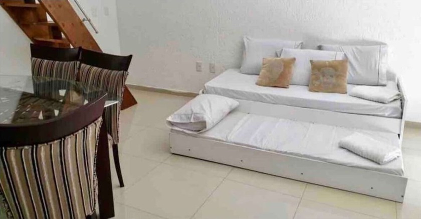 Imagen de la habitación del Hotel Joaquina Guest House. Foto 19