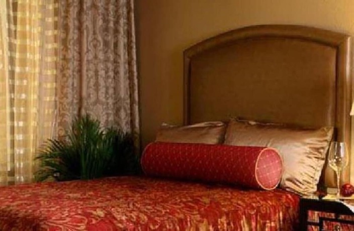 Imagen de la habitación del Hotel Jockey Club Suites. Foto 7