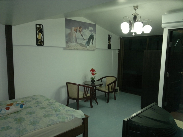 Imagen de la habitación del Hotel Joe Palace. Foto 13