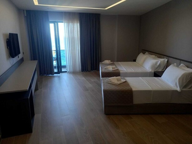 Imagen de la habitación del Hotel Joelle Premium. Foto 19