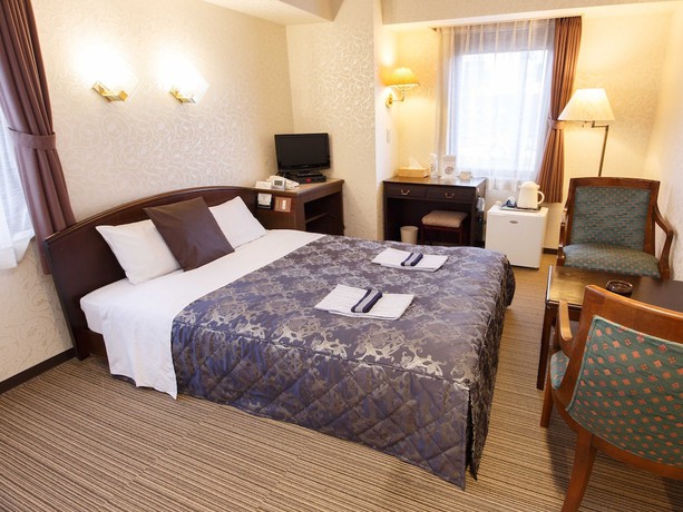 Imagen de la habitación del Hotel Joetsu Sun Plaza. Foto 18