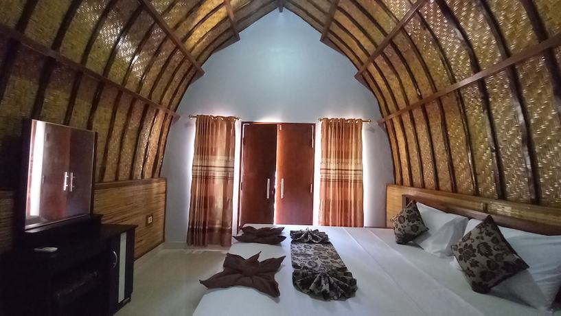 Imagen de la habitación del Hotel Joevana Cottage. Foto 11