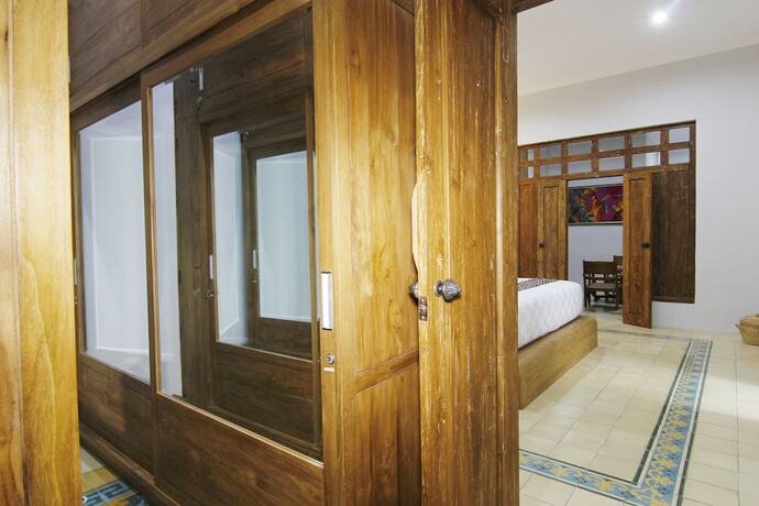 Imagen de la habitación del Hotel Joglo Mandapa Boutique and Resto. Foto 15