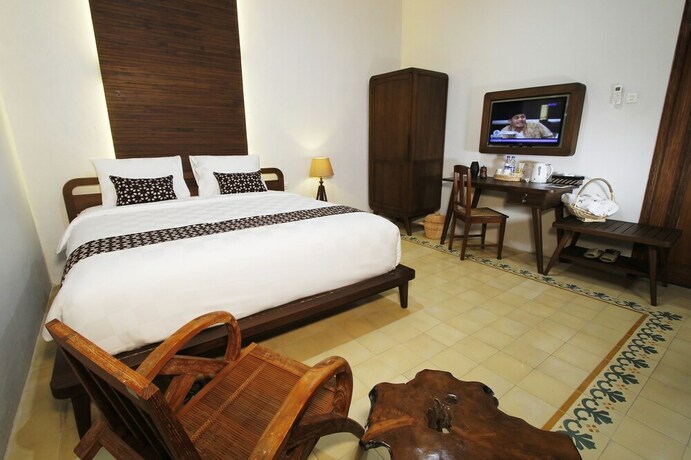 Imagen de la habitación del Hotel Joglo Mandapa Boutique and Resto. Foto 23