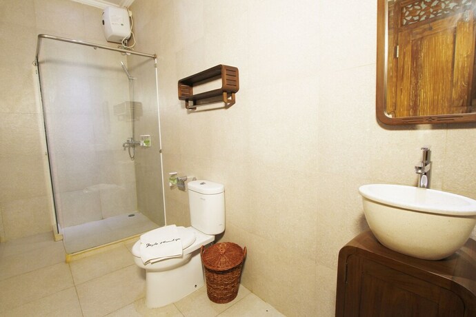 Imagen de la habitación del Hotel Joglo Mandapa Boutique and Resto. Foto 25