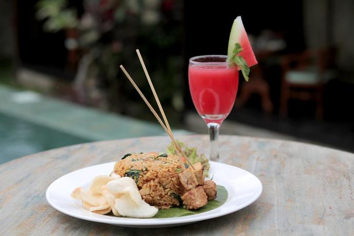 Imagen del bar/restaurante del Hotel Joglo Taman Sari Ubud. Foto 8
