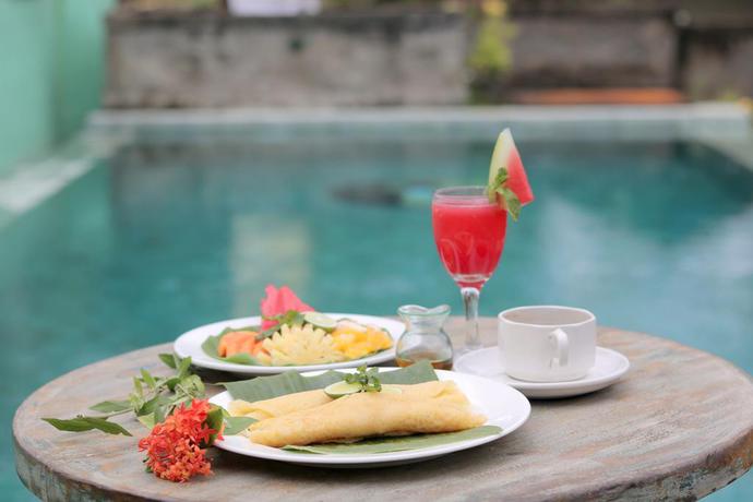 Imagen del bar/restaurante del Hotel Joglo Taman Sari Ubud. Foto 10