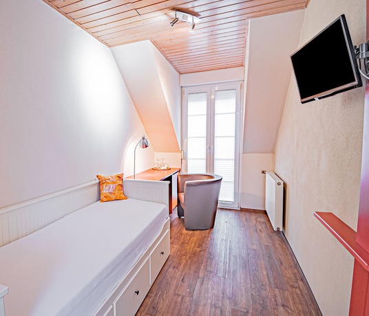 Imagen de la habitación del Hotel Johannishof Wine-Cafe and Guesthouse. Foto 7