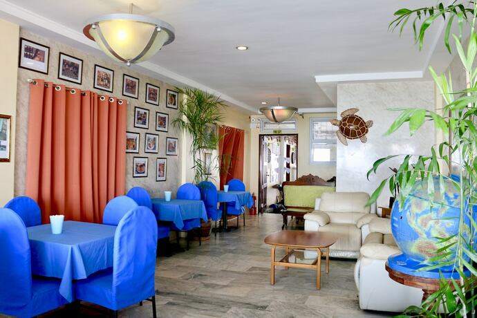 Imagen del bar/restaurante del Hotel Johan's Beach and Dive Resort. Foto 5