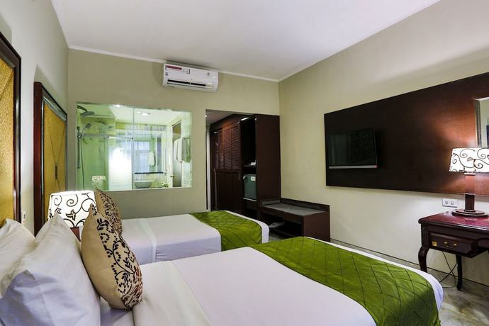Imagen de la habitación del Hotel Johns Pardede International. Foto 8