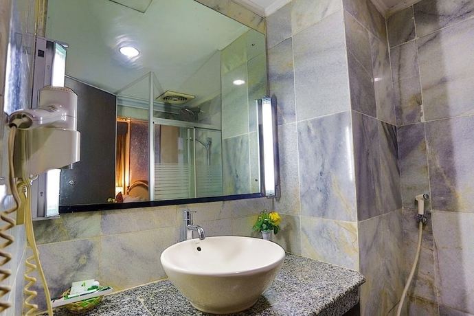 Imagen de la habitación del Hotel Johns Pardede International. Foto 10