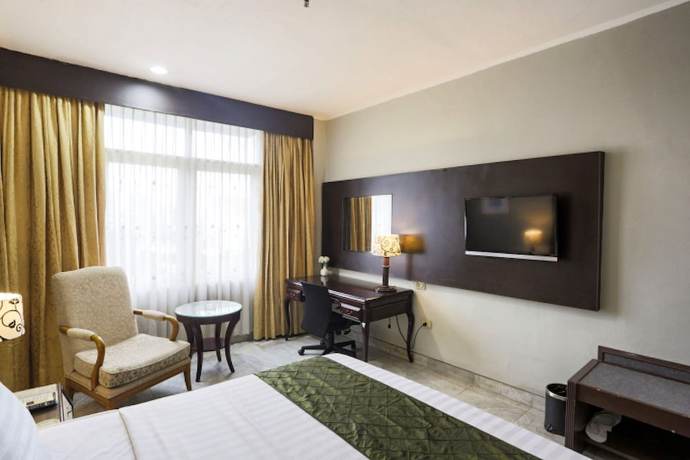 Imagen de la habitación del Hotel Johns Pardede International. Foto 13