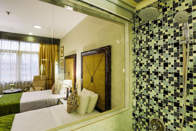 Imagen de la habitación del Hotel Johns Pardede International. Foto 14